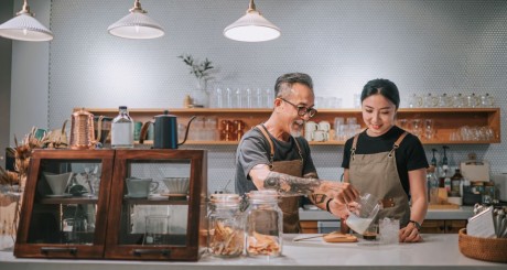 2 business owners run a cafe | The Importance of Commercial General Liability for Small Businesses