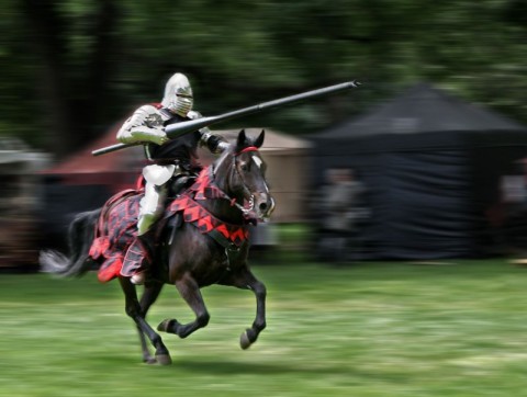 a knight on his horse with his lance