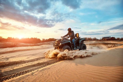 man riding an atv